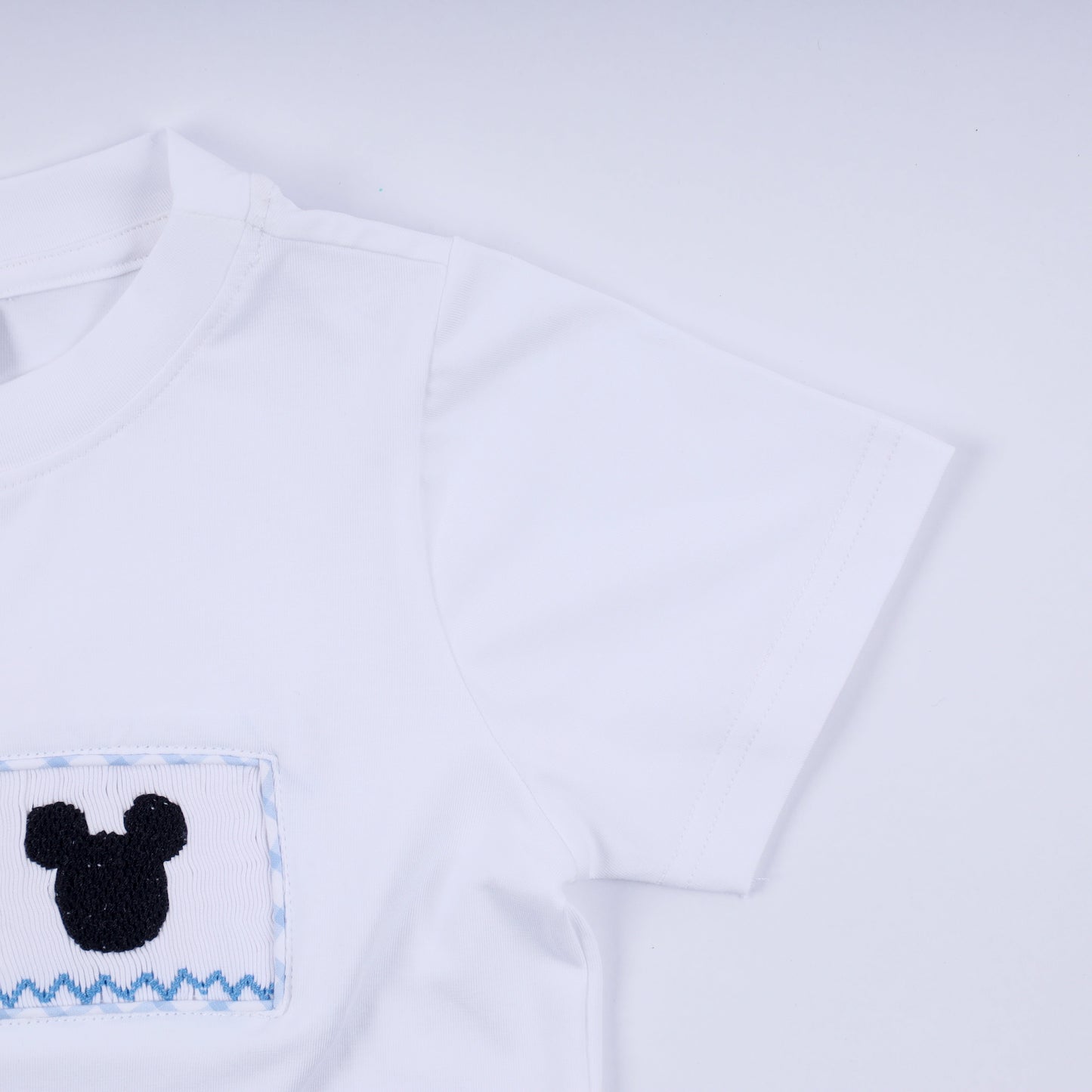 Blue character hand smocked gingham shorts set