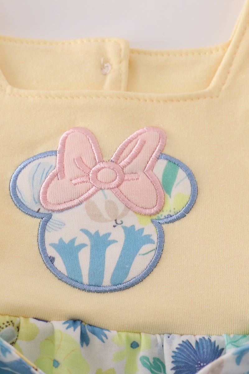 Yellow floral character applique bubble